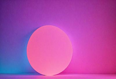 The primary subject of the image is a large, illuminated, pink and purple circle. The circle is placed on a pink background, which adds a vibrant and lively atmosphere to the scene. The visual style of the image is a combination of photo and digital art, creating a unique and eye-catching presentation. The colors and mood of the image are predominantly pink and purple, giving it a warm and inviting feel.