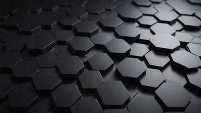 The primary subject of the image is a pattern of black and white hexagons. The setting is a black background, which creates a striking contrast with the white hexagons. The visual style is a close-up of the hexagons, showcasing their intricate design. The colors and mood of the image are predominantly black and white, giving it a modern and minimalist appearance.