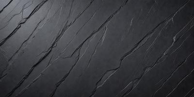 The primary subject of the image is a black and white photo of a wall with a textured surface. The setting is a room with a black background, and the visual style is a close-up of the wall. The colors and mood of the image are predominantly black and white, creating a dramatic and moody atmosphere.