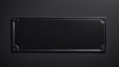 The primary subject of the image is a black leather surface. The setting is a dark room, and the visual style is a close-up of the leather surface. The colors and mood of the image are predominantly dark and moody, with the black leather serving as the focal point.