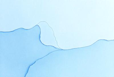 The primary subject of the image is a blue surface with a white line running through it. The setting appears to be a white wall, and the visual style is a combination of a photo and digital art. The dominant colors are blue and white, creating a calm and serene atmosphere.