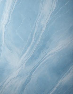 The primary subject of the image is a blue and white marbled wall. The setting is a room with a blue and white marbled wall as the main focus. The visual style is a photo of the marbled wall. The dominant colors are blue and white, creating a calm and soothing atmosphere.