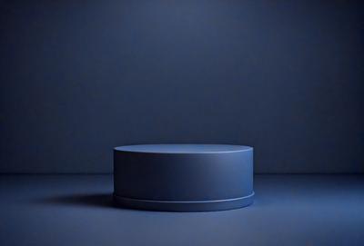 The primary subject of the image is a blue, round, and flat object, which appears to be a piece of art or a decorative item. The setting is a dark blue background, which contrasts with the blue object. The visual style is a close-up of the blue object, emphasizing its shape and color. The colors and mood of the image are predominantly dark and moody, with the blue object standing out against the dark background.