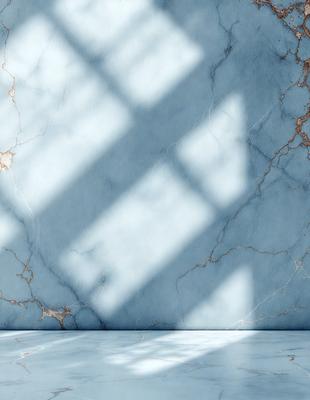The primary subject of the image is a marble wall with a blue tint. The setting is a room with a window, and the visual style is a photo. The colors and mood of the image are predominantly blue, creating a calm and serene atmosphere.