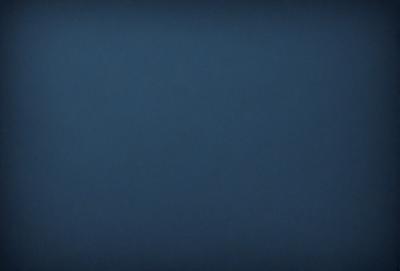 The primary subject of the image is a large, dark blue sky. The setting is a vast, open space with no visible landmarks or objects. The visual style is a natural, untouched environment. The colors and mood are predominantly dark and moody, with the blue sky serving as the main focal point.