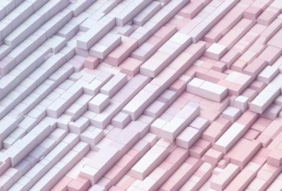The primary subject of the image is a large, intricate pattern made of white and pink blocks. The setting is a white and pink background, which creates a visually striking contrast with the blocks. The visual style of the image is a combination of digital art and illustration, as the blocks are arranged in a complex and detailed manner. The colors and mood of the image are predominantly white and pink, giving it a clean and elegant appearance.