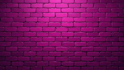 The primary subject of the image is a purple brick wall. The setting is a brick wall, and the visual style is a photo. The dominant colors are purple and pink, creating a warm and inviting atmosphere.