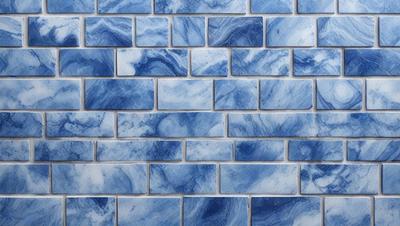 The primary subject of the image is a blue tile wall. The setting is a room with a blue tile wall as the main focus. The visual style is a photo of the blue tile wall. The dominant colors are blue and white, creating a calm and soothing atmosphere.