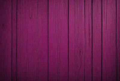 The primary subject of the image is a purple wooden wall. The setting is a room with a purple wooden wall, which serves as the background. The visual style is a close-up of the purple wooden wall, showcasing its texture and color. The dominant colors are purple and brown, creating a warm and inviting atmosphere.