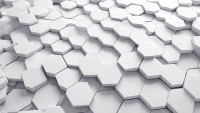 The primary subject of the image is a white, geometric pattern. The pattern is composed of hexagons, which are arranged in a visually appealing manner. The setting is a white wall, which serves as the background for the pattern. The visual style of the image is a combination of photo and digital art, as it appears to be a close-up of the pattern, yet it has a clean and crisp appearance. The colors and mood of the image are predominantly white, giving it a clean and minimalist feel.