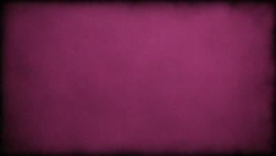 The primary subject of the image is a large, purple wall. The setting is a room with a purple background, and the visual style is a close-up of the wall. The colors and mood of the image are predominantly purple, creating a calm and serene atmosphere.