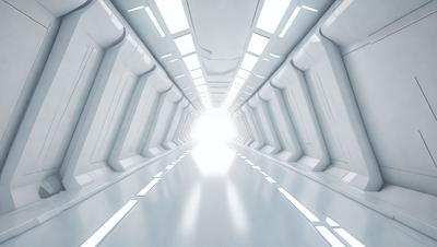 The primary subject of the image is a long, white hallway with a bright light shining through it. The setting is a white room, and the visual style appears to be a photo. The colors and mood of the image are predominantly white, creating a clean and minimalistic atmosphere.