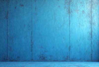 The primary subject of the image is a blue wall with a peeling paint texture. The setting is a room with a blue wall, and the visual style is a photo. The dominant colors are blue and white, and the overall atmosphere is somewhat dull and aged due to the peeling paint.