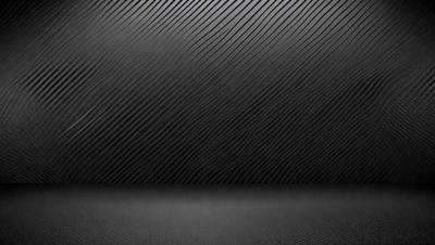 The primary subject of the image is a black background with a pattern of white lines. The setting is a dark room, and the visual style is a black and white photo. The dominant colors are black and white, creating a moody atmosphere.