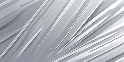 The primary subject of the image is a silver metal surface, which appears to be a metal sheet or a piece of metal art. The setting is a gray background, which contrasts with the silver metal surface. The visual style of the image is a close-up of the metal surface, showcasing its texture and details. The colors and mood of the image are predominantly silver and gray, giving it a sleek and modern appearance.
