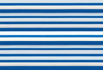 The primary subject of the image is a blue and white striped pattern. The setting is a white wall, and the visual style appears to be a digital art or illustration. The dominant colors are blue and white, creating a calm and soothing atmosphere.