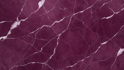 The primary subject of the image is a marbled wall with a purple hue. The setting is a room with a purple marbled wall, which serves as the background. The visual style is a close-up of the marbled wall, showcasing its texture and pattern. The colors and mood of the image are predominantly purple, creating a calm and sophisticated atmosphere.