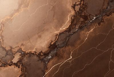 The primary subject of the image is a marble surface with a brown and yellow color palette. The setting is a stone wall, and the visual style appears to be a photo. The colors and mood of the image are warm and earthy, creating a natural and organic atmosphere.