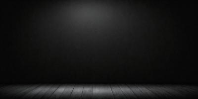 The primary subject of the image is a wooden floor with a black background. The setting is a dark room, and the visual style is a black and white photo. The colors and mood of the image are predominantly dark and moody, creating a sense of mystery and depth.