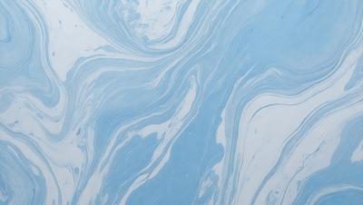 The primary subject of the image is a blue and white swirling pattern, which appears to be a painting or a digital artwork. The setting is a white background, which provides a clean and minimalist appearance. The visual style is a combination of painting and digital art, creating a unique and artistic representation of the swirling pattern. The colors and mood of the image are predominantly blue and white, giving it a calm and serene atmosphere.