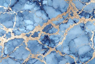 The primary subject of the image is a blue and gold marbled wall. The setting is a room with a blue and gold marbled wall, which serves as the background. The visual style of the image is a photo, capturing the intricate details of the marbled wall. The dominant colors in the image are blue and gold, creating a luxurious and elegant atmosphere.
