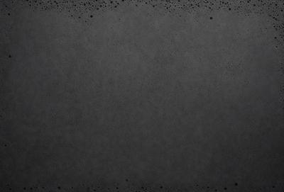 The primary subject of the image is a black and white photo of a gray background. The setting is a black and white photo of a gray background. The visual style is a black and white photo of a gray background. The colors and mood are predominantly gray and neutral, creating a calm and minimalist atmosphere.