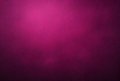 The primary subject of the image is a purple background. The setting is a dark, foggy environment, creating a moody atmosphere. The visual style is a close-up of the purple background, which appears to be a pattern or texture. The colors and mood of the image are predominantly purple, with a hint of darkness, giving it a mysterious and intriguing appearance.