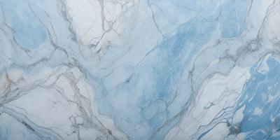 The primary subject of the image is a marble-like surface with a blue and white color scheme. The setting is a bathroom, as indicated by the presence of a sink. The visual style is a close-up of the marble, showcasing its intricate patterns and textures. The colors and mood of the image are serene and elegant, with the blue and white hues creating a calming atmosphere.