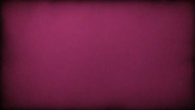 The primary subject of the image is a large, purple wall. The setting is a room with a pink background. The visual style is a close-up of the purple wall, which gives a sense of depth and texture. The colors and mood of the image are predominantly purple, creating a calm and serene atmosphere.
