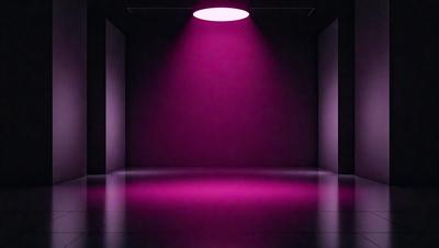 The primary subject of the image is a purple light shining on a wall. The setting is a dark room with a purple glow, creating a moody atmosphere. The visual style is a black and white photo, which adds a sense of depth and contrast to the scene. The dominant colors are purple and black, with the purple light creating a striking visual effect.