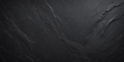 The primary subject of the image is a black leather surface, which appears to be a leather wall or a leather-like material. The setting is a dark room, and the visual style is a close-up of the leather surface. The colors and mood of the image are predominantly dark and moody, with the black leather surface being the main focus.