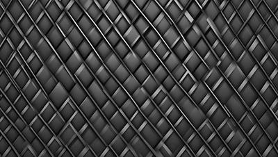 The primary subject of the image is a black and white pattern, which appears to be a woven or textured surface. The setting is a black background, which contrasts with the pattern. The visual style is a close-up of the pattern, showcasing its intricate details. The colors and mood of the image are predominantly black and white, giving it a classic and timeless appearance.