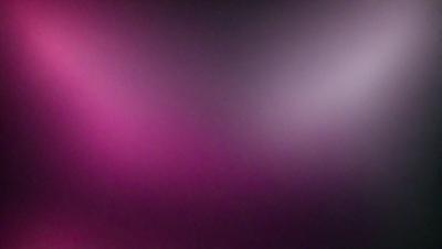 The primary subject of the image is a pink background. The setting is a dark room, and the visual style appears to be a photo. The dominant colors are pink and purple, creating a warm and inviting atmosphere.
