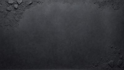 The primary subject of the image is a large, empty, and dark gray surface. The setting is a black background, and the visual style is a photo. The colors and mood of the image are dark and moody, with the gray surface creating a sense of emptiness or mystery.