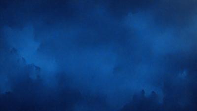The primary subject of the image is a blue sky with clouds. The setting is a cloudy day, and the visual style is a photo. The dominant colors are blue and white, creating a calm and serene atmosphere.