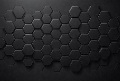 The primary subject of the image is a black and white pattern, which appears to be a close-up of a black background. The setting is a dark room, and the visual style is a black and white photo. The dominant colors are black and white, creating a moody and dramatic atmosphere.