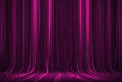 The primary subject of the image is a purple curtain, which is the main object, scene, or focus of the image. The setting/background consists of a pink background, which adds to the overall atmosphere of the image. The visual style of the image is a photo, capturing the purple curtain in its natural environment. The colors and mood of the image are predominantly purple and pink, creating a warm and inviting atmosphere.
