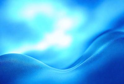 The primary subject of the image is a blue, textured surface that resembles a wave. The setting is a cloudy sky, which serves as the backdrop for the blue surface. The visual style is a combination of a photo and digital art, creating a unique and artistic representation of the blue wave. The colors and mood of the image are predominantly blue, with a slightly moody atmosphere, giving the impression of a calm and serene ocean scene.