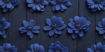 The primary subject of the image is a collection of blue flowers arranged on a wooden wall. The flowers are positioned in various orientations, creating a visually appealing display. The setting is a wooden wall, which serves as the backdrop for the flowers. The visual style of the image is a combination of photo and digital art, as it captures the beauty of the flowers in a realistic yet artistic manner. The dominant colors in the image are blue, which is the color of the flowers, and the wooden wall, which adds