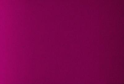 The primary subject of the image is a large, purple wall. The setting is a room with a purple background, and the visual style is a close-up of the wall. The colors and mood of the image are predominantly purple, creating a calm and serene atmosphere.