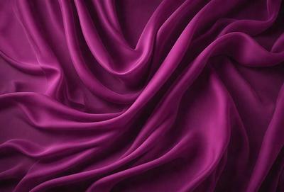 The primary subject of the image is a purple fabric, which is the main object, scene, or focus of the image. The setting or background consists of a purple curtain, and the visual style is a close-up of the purple fabric. The colors and mood of the image are predominantly purple, creating a calm and serene atmosphere.