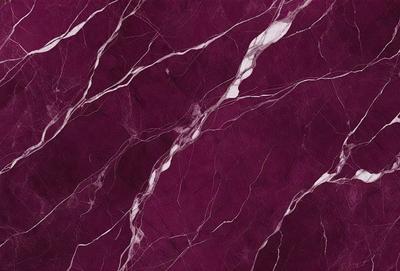 The primary subject of the image is a marbled wall with a purple hue. The setting is a room with a purple marbled wall as the main focus. The visual style is a close-up of the marbled wall, showcasing its intricate patterns. The colors and mood of the image are predominantly purple, creating a calm and elegant atmosphere.