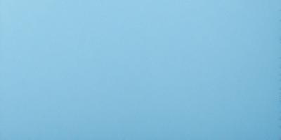 The primary subject of the image is a large, open, and empty blue sky. The setting is a vast, cloudless expanse, with no visible landmarks or objects. The visual style is a natural, untouched landscape, with no indication of digital manipulation or artistic elements. The colors and mood are predominantly blue, conveying a sense of tranquility and vastness.