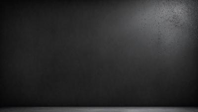 The primary subject of the image is a person standing in front of a black wall. The setting appears to be a dark room, and the visual style is a photo. The dominant colors in the image are black and white, creating a moody atmosphere.