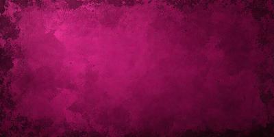 The primary subject of the image is a large, pink, textured surface. The setting is a room with a pink wall, and the visual style is a close-up of the wall. The colors and mood of the image are predominantly pink, creating a warm and inviting atmosphere.