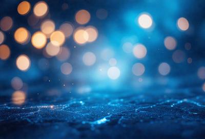 The primary subject of the image is a blue background with a pattern of lights, creating a visually striking and unique atmosphere. The setting appears to be a dark, possibly underwater, environment. The visual style of the image is a combination of digital art and photography, with the lights creating a dynamic and intriguing pattern. The colors and mood of the image are predominantly blue, with the lights adding a sense of depth and contrast to the overall composition.