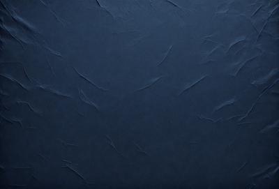 The primary subject of the image is a blue wall with a textured surface. The setting is a room with a blue background. The visual style is a close-up of the blue wall, which gives a sense of depth and texture. The colors and mood of the image are predominantly blue, creating a calm and serene atmosphere.