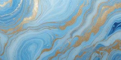 The primary subject of the image is a blue and gold swirling pattern, which appears to be a painting or a digital artwork. The setting is a blue background, and the visual style is a combination of photo and digital art. The colors and mood of the image are vibrant and lively, with the blue and gold colors creating a sense of depth and movement.
