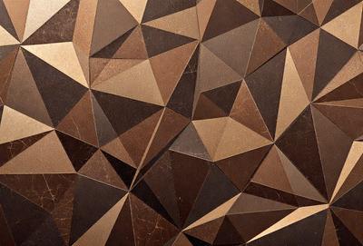 The primary subject of the image is a close-up of a brown and gold patterned surface, which appears to be a wall or a piece of artwork. The setting is indoors, with the surface being the main focus of the image. The visual style is a combination of a photo and a digital artwork, creating a unique and intricate pattern. The colors and mood of the image are warm and inviting, with the brown and gold tones evoking a sense of richness and sophistication.