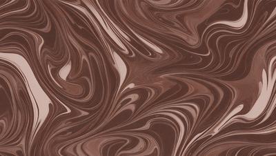 The image features a brown and white marbled pattern on a surface, possibly a wall or a table. The pattern is intricate and visually appealing, creating a sense of depth and texture. The colors in the image are predominantly brown and white, giving it a warm and earthy feel. The overall atmosphere of the image is elegant and sophisticated, with the marbled pattern serving as a striking focal point.